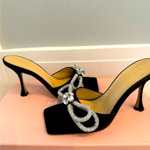 Mach & Mach satin mule sandals with double crystal bow accent.